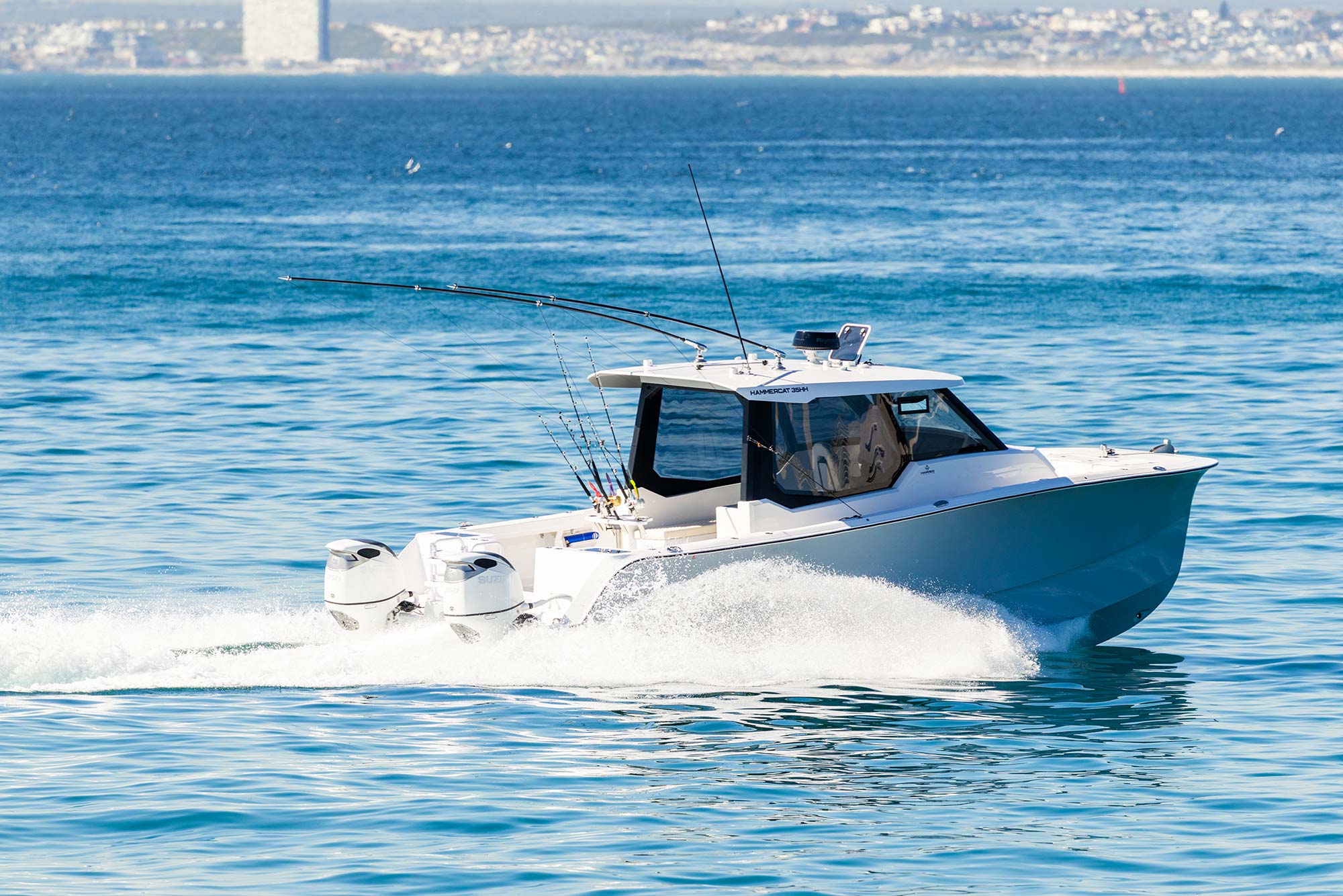 HammerCat power catamaran running offshore in rough water